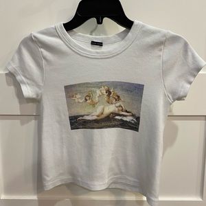 White Brandy Melville shirt with design on front